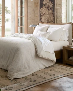 Kennie Upholstered Bed Frame with Carved Solid Oak and Linen Headboard