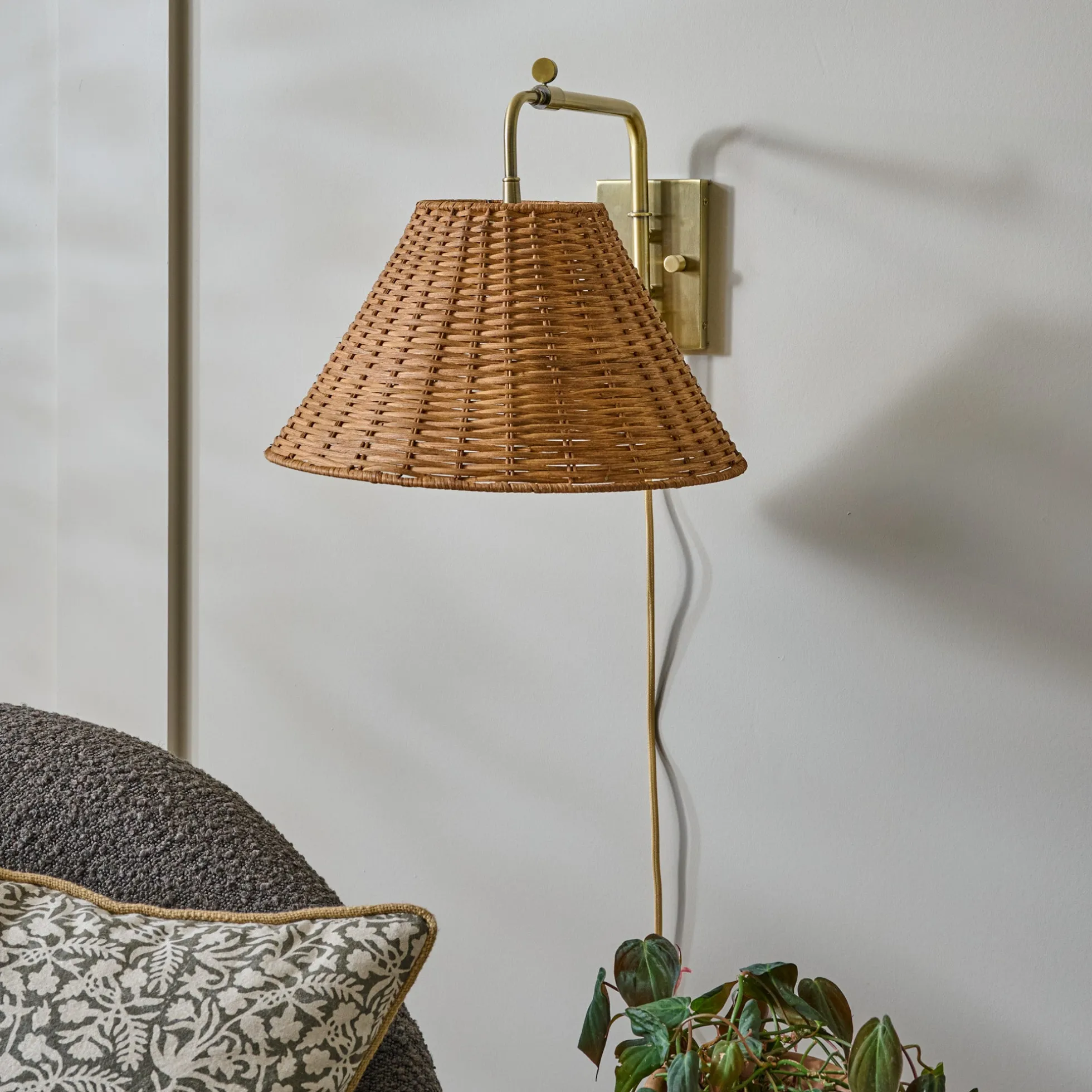 Tapered Rattan Swivel Plug-In Sconce